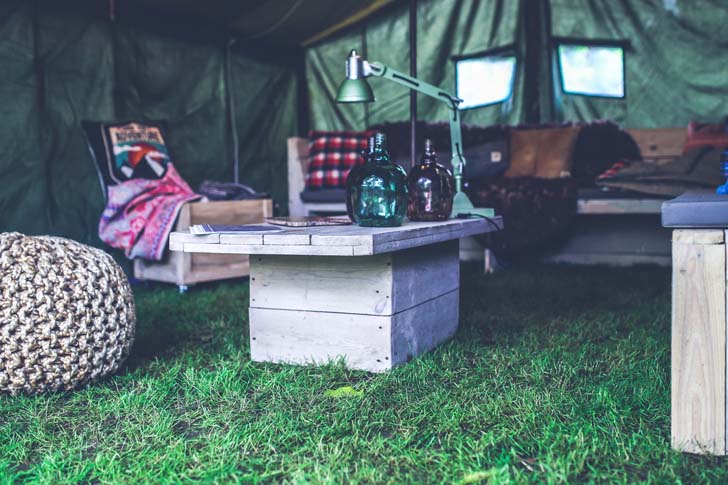 kaboompics.com_Interior of military tent - wooden table